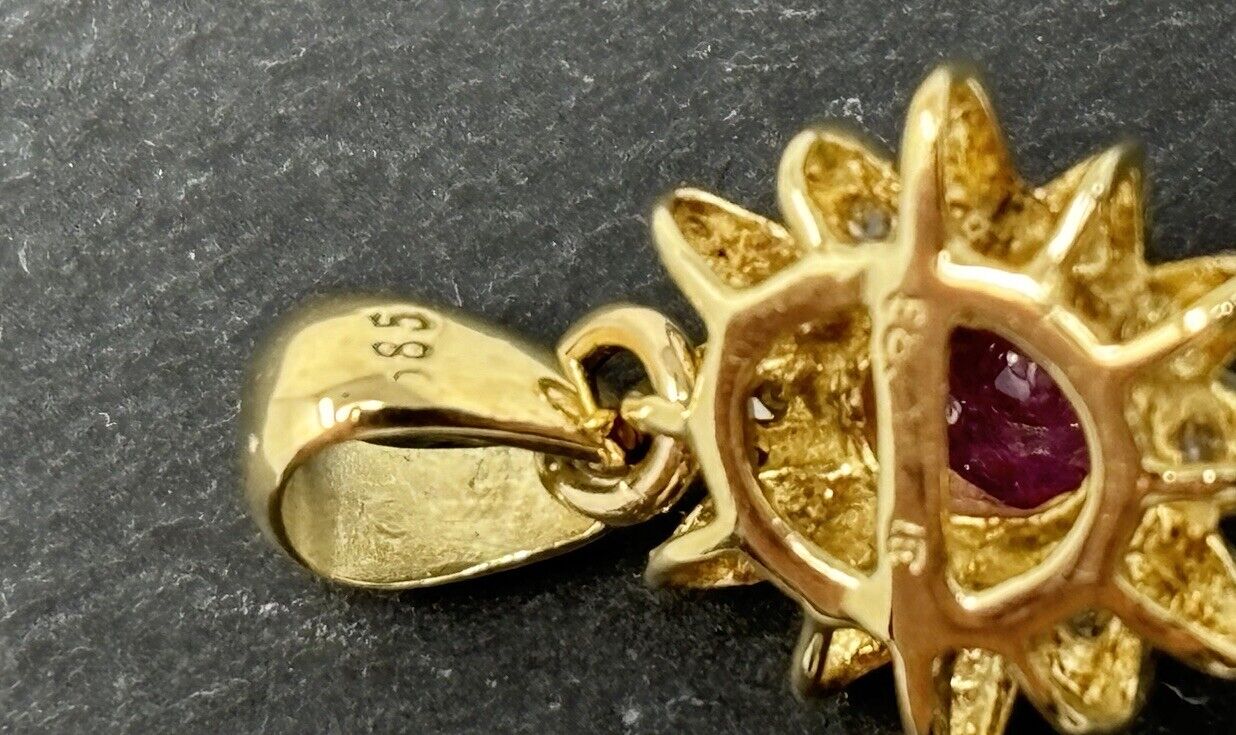 Gold Anhänger 14K/585 Gelbgold Rubin ca. 0,2ct mit Diamanten Stern/Blume No.135