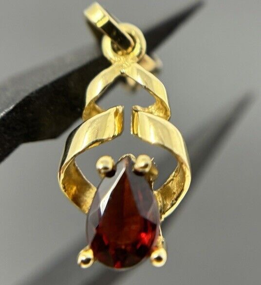 Gold Anhänger gezwirbelt 8K/333 Granat Tropfenschliff No.U58 verkauft