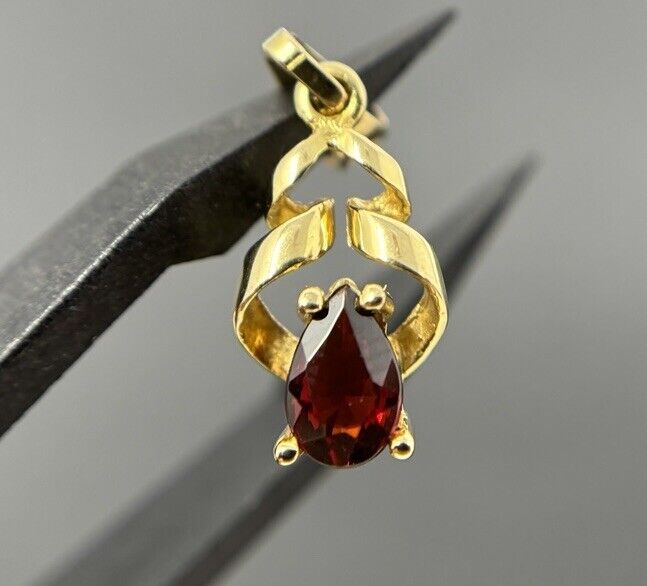 Gold Anhänger gezwirbelt 8K/333 Granat Tropfenschliff No.U58 verkauft