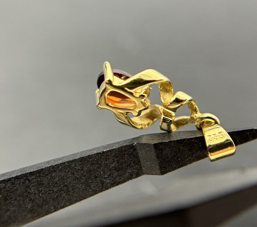 Gold Anhänger gezwirbelt 8K/333 Granat Tropfenschliff No.U58 verkauft