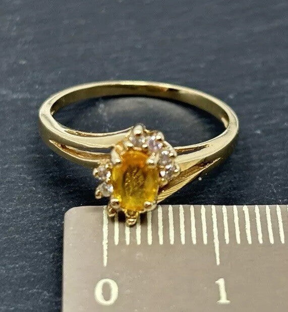 Gelbgold Ring gelber 0,7ct Saphir Brillanten Entourage 14K/585 