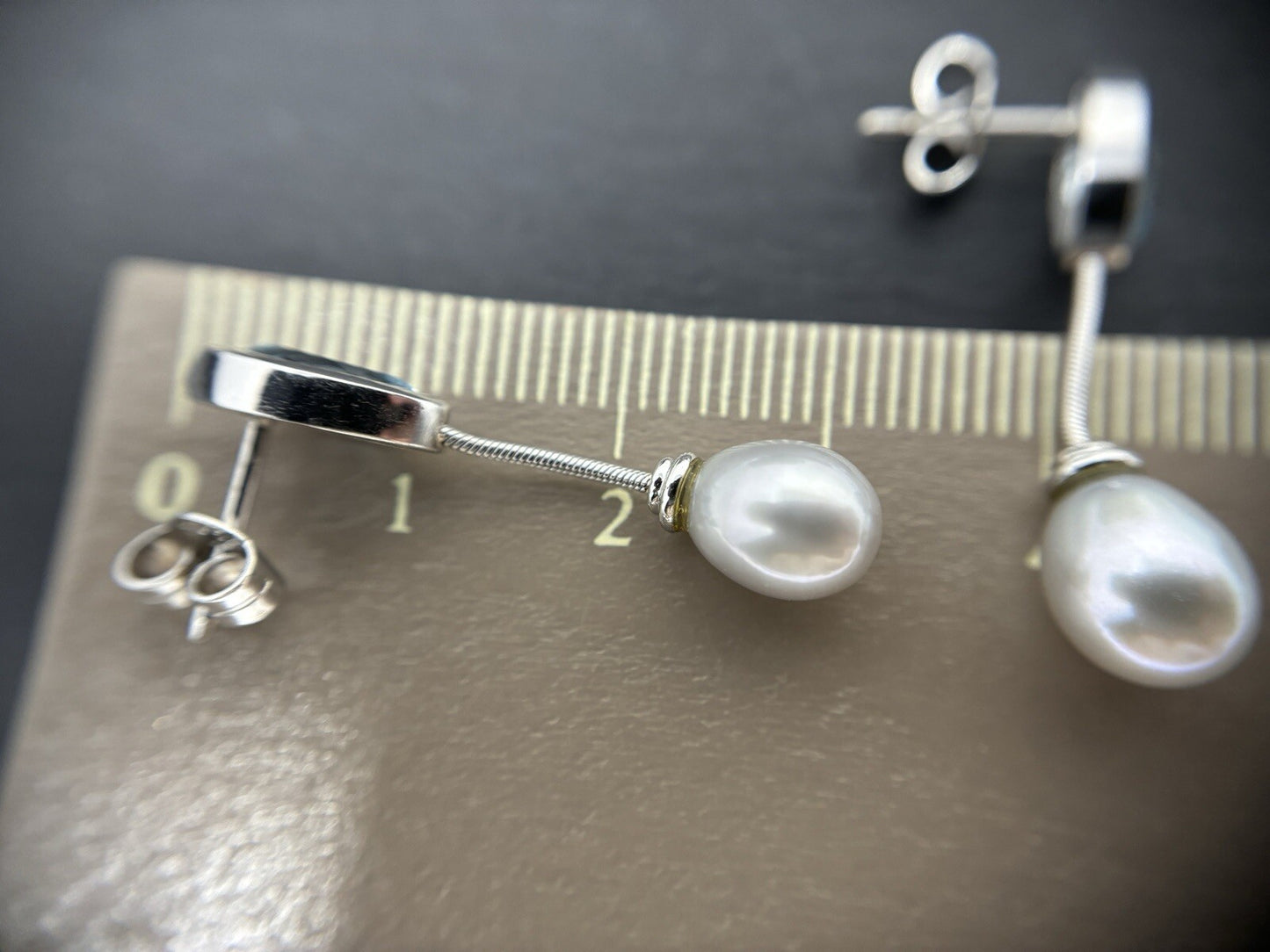 Ohrringe 14Karat Weißgold mit Blautopasen und Perlen 